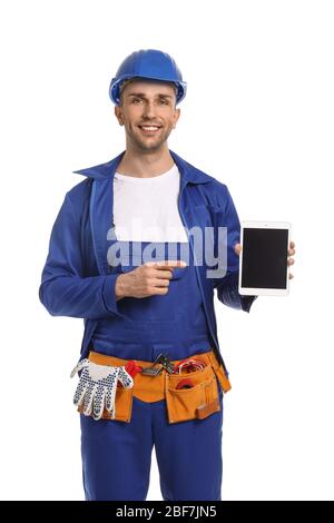 Handsome male worker with tablet computer on white background Stock Photo