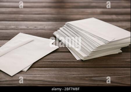 Many paper envelopes on table Stock Photo