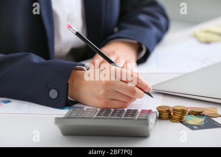 Bank manager working in office, closeup Stock Photo