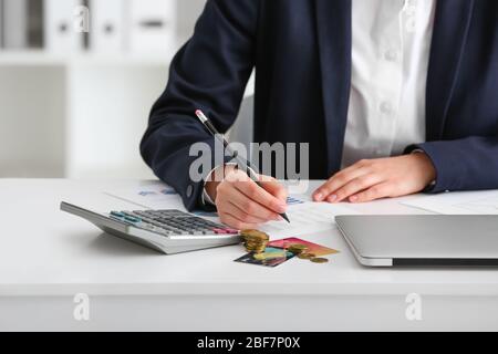 Bank manager working in office, closeup Stock Photo
