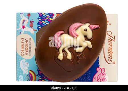 Thorntons milk chocolate Unicorn Easter Egg removed from box and placed on top isolated on white background ready for Easter Stock Photo