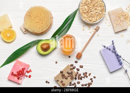Spa items and honey on white wooden background Stock Photo