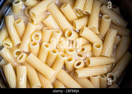 Download Yellow Italian Cooked Pasta Tortiglioni Abstract Background Traditional Food Texture Stock Photo Alamy Yellowimages Mockups
