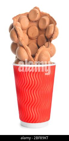 Delicious sweet bubble waffle in cup on white background Stock Photo