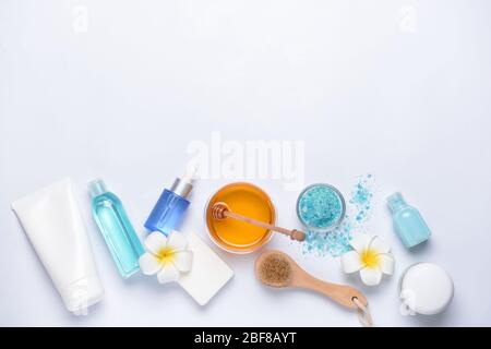 Composition with spa items and honey on white background Stock Photo