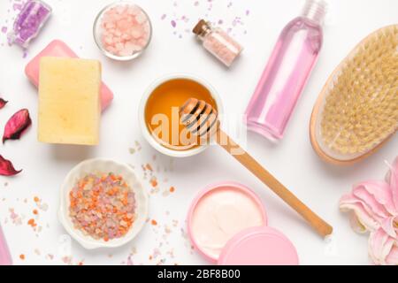 Composition with spa items and honey on white background Stock Photo