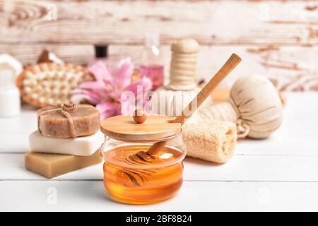 Composition with spa items and honey on table Stock Photo
