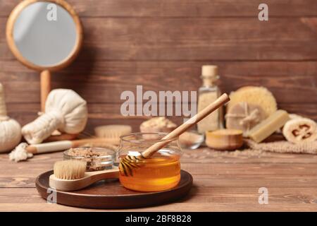 Composition with spa items and honey on table Stock Photo