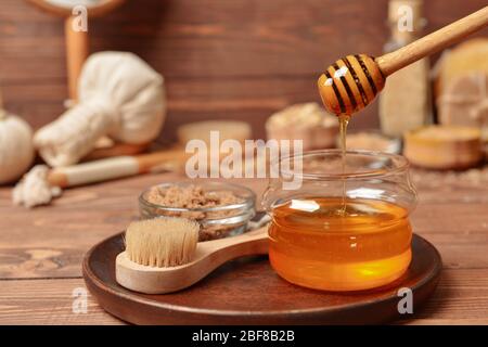 Composition with spa items and honey on table Stock Photo