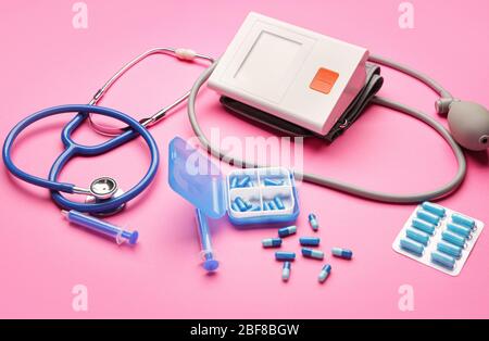 First aid kit on color background Stock Photo