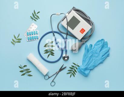 First aid kit on color background Stock Photo