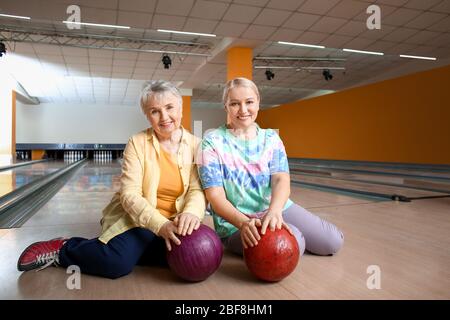 Portrait of senior women in bowling club Stock Photo