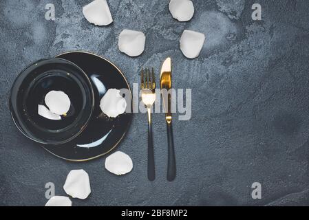 Simple table setting on dark background Stock Photo