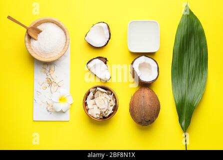 Composition with different coconut products on color background Stock Photo