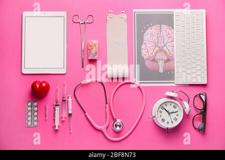 Composition with medical supplies on color background Stock Photo