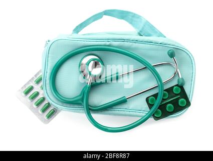 First aid kit with stethoscope on white background Stock Photo