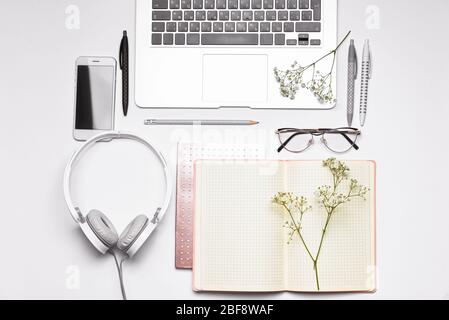 Set of school supplies with modern devices on white background Stock Photo
