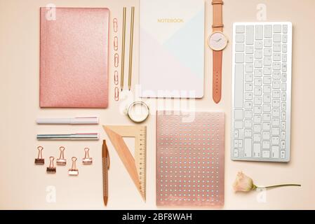 Set of school supplies with computer keyboard on color background Stock Photo