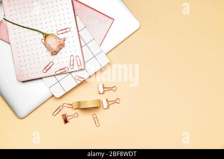 Set of school supplies with laptop on color background Stock Photo