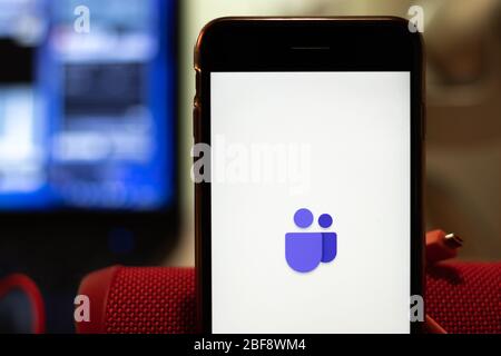 Los Angeles, California, USA - 16 April 2020: Microsoft Teams logo on screen close up. App store icon visible on phone display, Illustrative Editorial Stock Photo