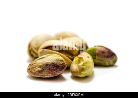 Pistachio nuts isolated on white background Stock Photo
