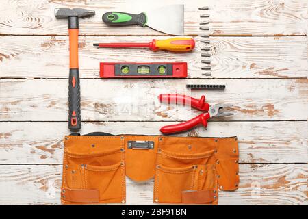 Builder's tools on wooden background Stock Photo