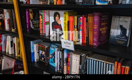 Biography books from various authors on display at a book store. Stock Photo