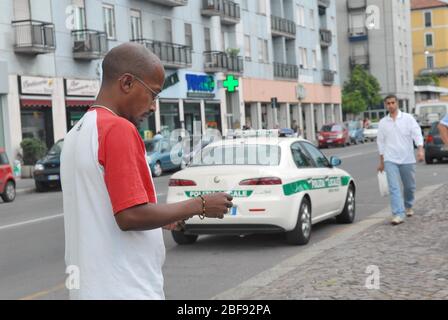 Milano (Italy) immigrants in Padova street Stock Photo