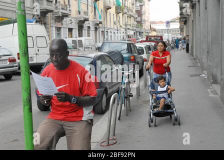 Milano (Italy) immigrants in Padova street Stock Photo