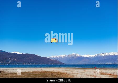 21-02-2016-Lake Maggiore -Ispra-Italy- man performs sailing sports on land kytesurf tricycle Stock Photo