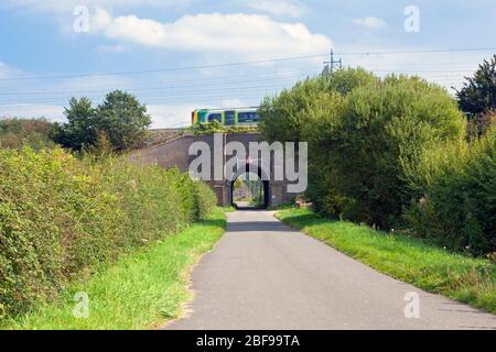 England, Buckinghamshire, Cheddington, Railway bridge below West Coast Mainline near Pitstone Wharf Stock Photo