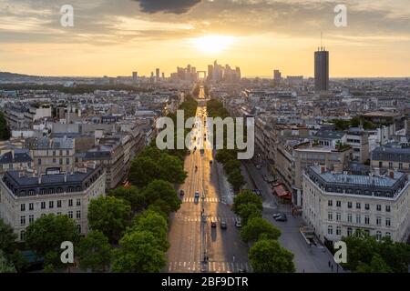 Paris cityscape at sunset, view down Avenue de la Grande-Armée, as seen from the Arc de Triomphe Stock Photo