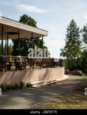 Wendover Woods Visitors Centre cafe / restaurant terrace. Wendover Woods Visitor Centre, Aylesbury, United Kingdom. Architect: Re-Format, 2018. Stock Photo