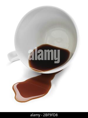 Overturned cup and spilled coffee on white background Stock Photo