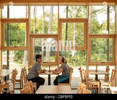 Wendover Woods Visitors Centre cafe / restaurant. Wendover Woods Visitor Centre, Aylesbury, United Kingdom. Architect: Re-Format, 2018. Stock Photo