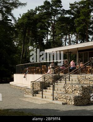 Wendover Woods Visitors Centre cafe / restaurant terrace with gabion walls. Wendover Woods Visitor Centre, Aylesbury, United Kingdom. Architect: Re-Fo Stock Photo