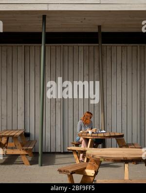 Wendover Woods Visitors Centre terrace. Wendover Woods Visitor Centre, Aylesbury, United Kingdom. Architect: Re-Format, 2018. Stock Photo