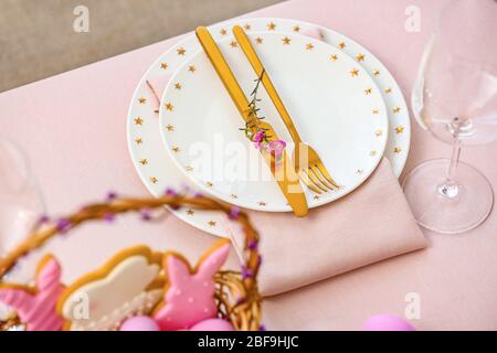 Beautiful table setting for Easter celebration Stock Photo