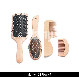 Hair brushes and combs on white background Stock Photo