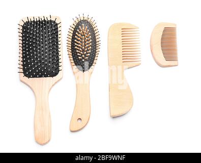 Hair brushes and combs on white background Stock Photo
