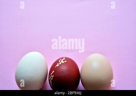 Easter eggs on pink background. Easter background. Stock Photo
