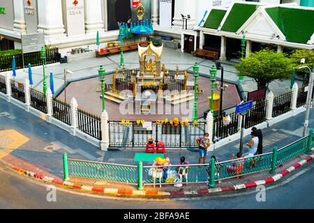 BANGKOK, THAILAND - APRIL 5, 2020: Erawan Shrine (Thao Maha Phrom Shrine) is located at the Ratchaprasong Intersection has been temporarily closed due Stock Photo
