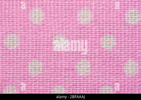 Pink and white spot pattern can be used for background. Polka dot macro texture of textile Stock Photo
