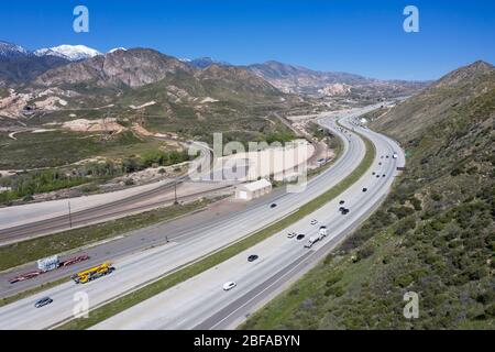 Aerial view of Interstate 15 (I-15) freeway as it climbs the grade at the Cajon Pass connecting Los Angeles with the desert and Las Vegas Stock Photo