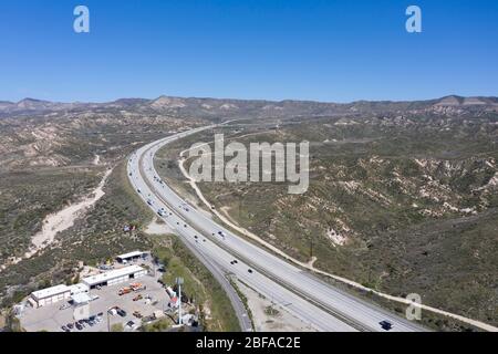 Aerial view of Interstate 15 (I-15) freeway as it climbs the grade at the Cajon Pass connecting Los Angeles with the desert and Las Vegas Stock Photo