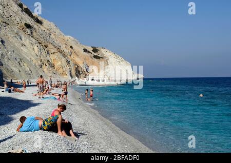 Skiathos, Greece - October 3rd 2012: Excursion boat from Skiathos town to Lalaria beach, the beach is reachable only by boat and a preferred destinati Stock Photo