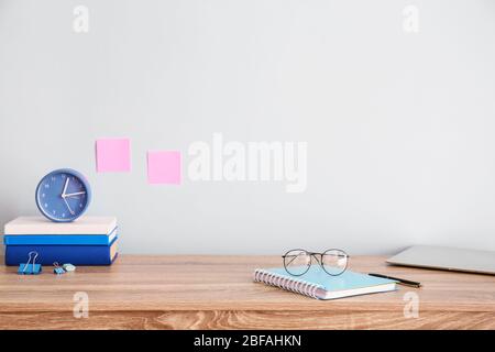 Modern stylish workplace near color wall Stock Photo