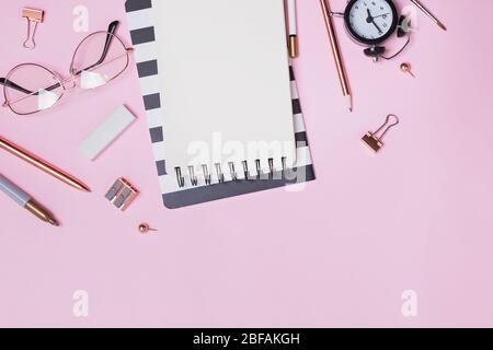 Stationery and office supplies on the pink background Stock Photo