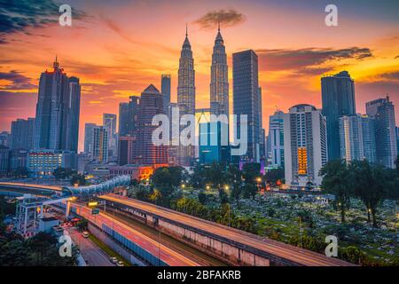 Cityscape of Kuala lumpur city skyline at sunrise in Malaysia. Stock Photo