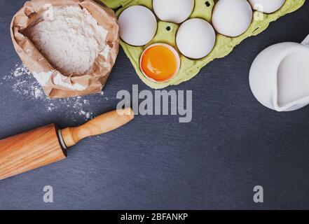 Ingredients for bakery on black stone background Stock Photo